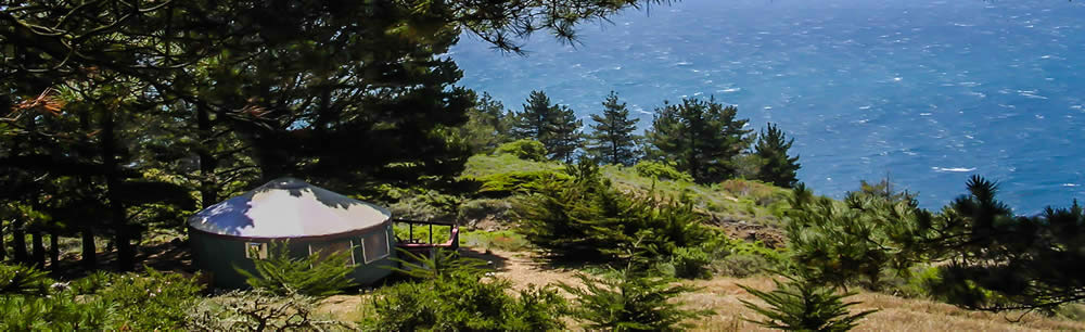 This is a picture of a single yurt on the coast